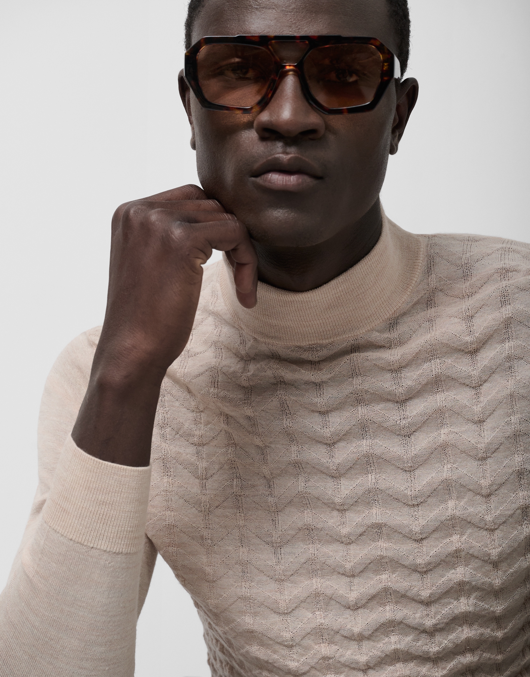 Light mink wool sweater with fantasy work