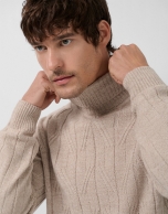 Sand-colored melange turtleneck sweater