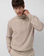 Sand-colored melange turtleneck sweater