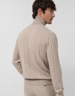 Sand-colored melange turtleneck sweater