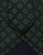 Green silk tie with white/navy geometric jacquard