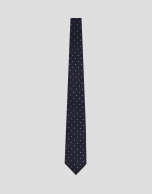 Navy blue jacquard silk tie with white trim