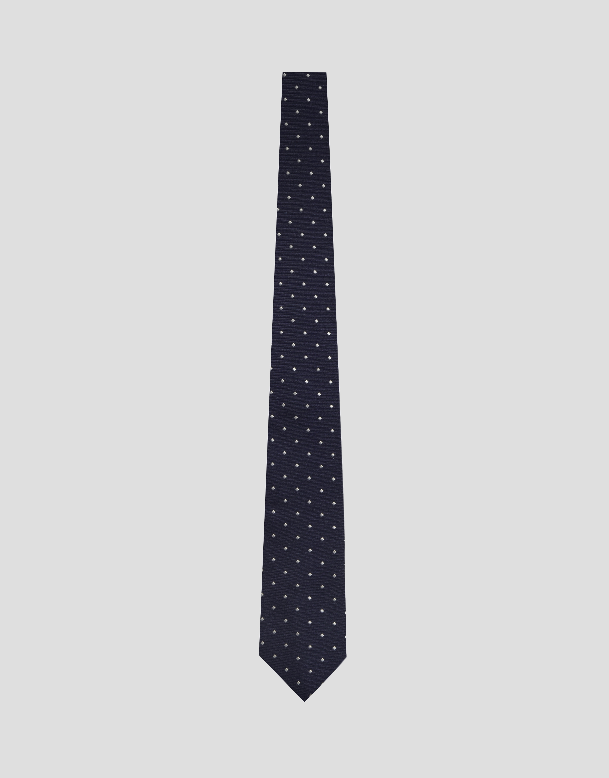 Navy blue jacquard silk tie with white trim