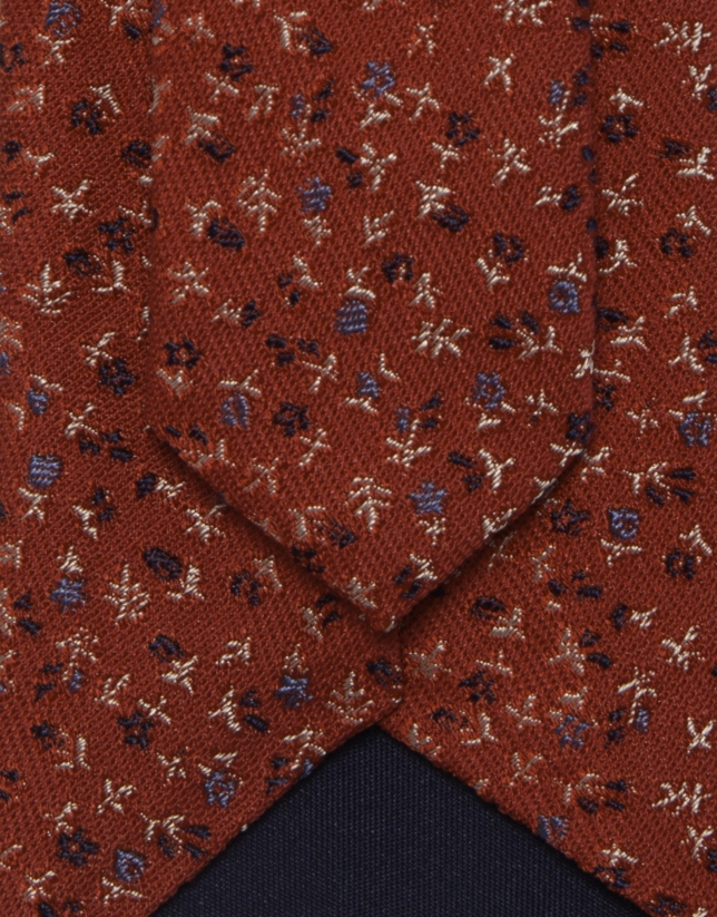 Red silk tie with jacquard flowers in blue tones