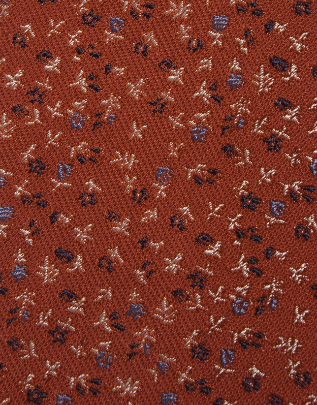 Red silk tie with jacquard flowers in blue tones