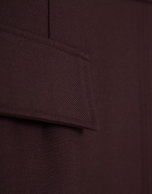 Straight midi skirt with front slit in burgundy
