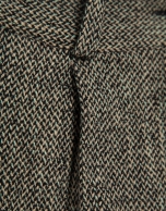 Wide-leg trousers with black and beige herringbone pleats