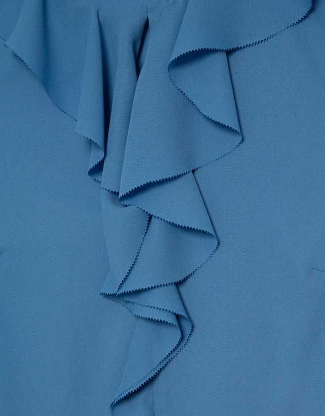 Blusa sin mangas en crepé azul con volante
