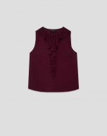 Blusa sin mangas en crepé rojo con volante