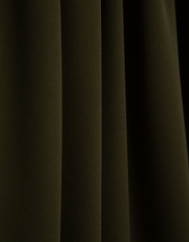 Sleeveless puffed blouse in green crepe