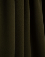 Sleeveless puffed blouse in green crepe
