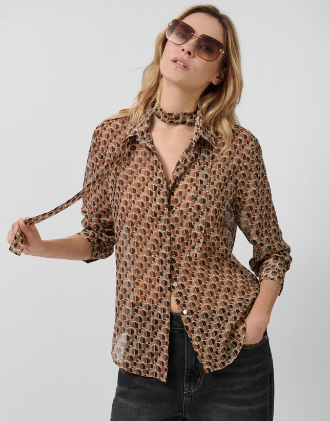 Blusa con lazada estampado geométrico tonos marrones
