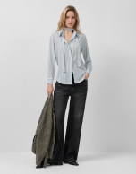 Blue striped shirt with bow at the neck