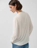 Blusa manga larga crudo con volante