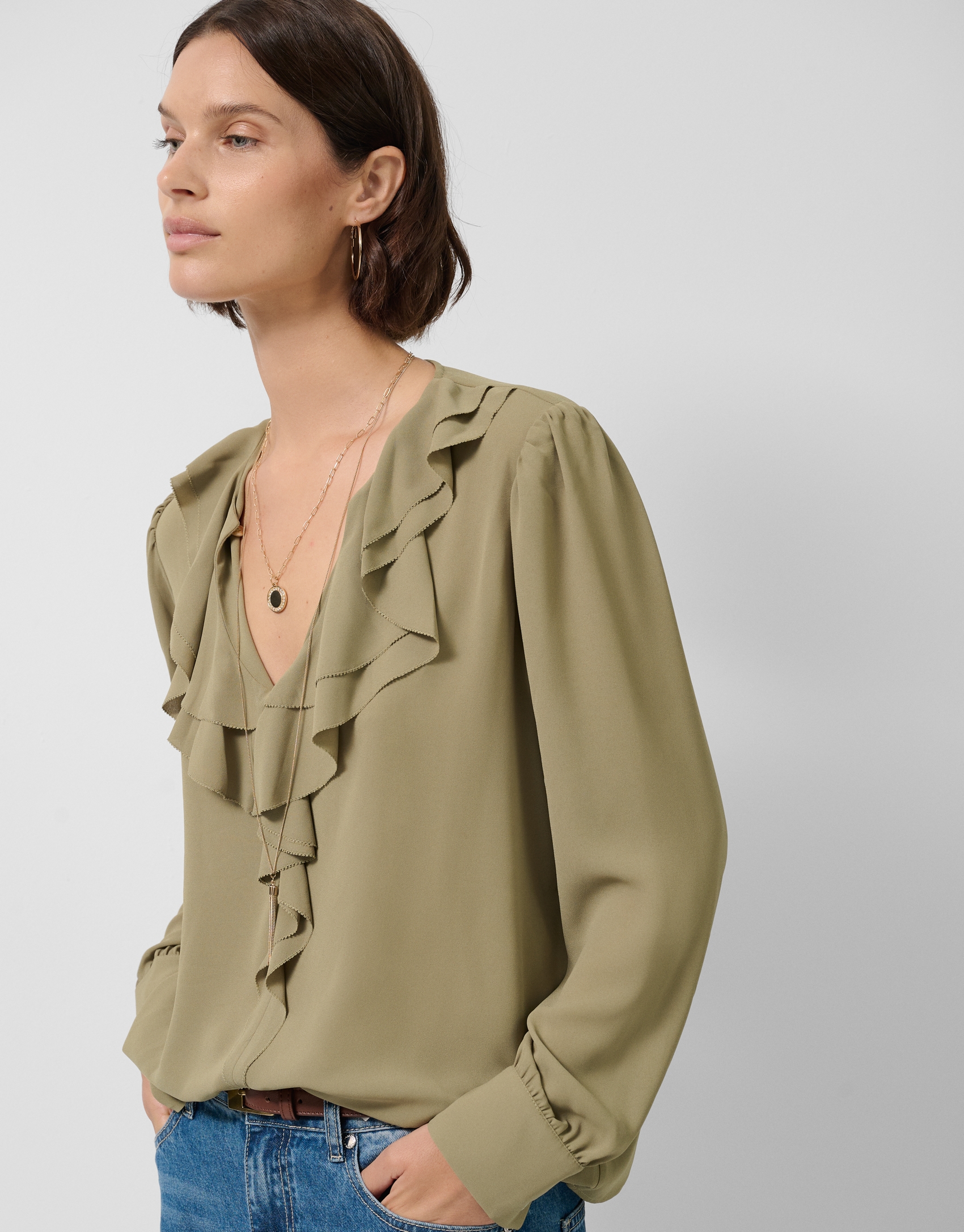 Blusa manga larga verde con volante