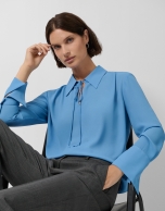 Blue crepe blouse with oversized cuffs