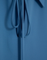 Blue crepe blouse with oversized cuffs