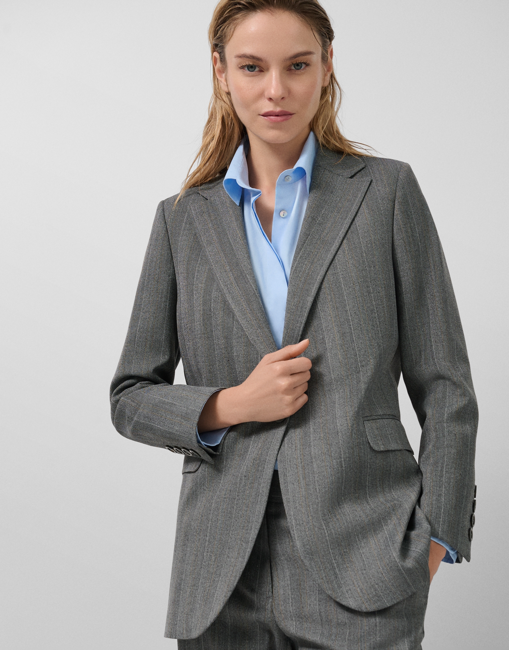 One-button grey herringbone blazer with camel trim