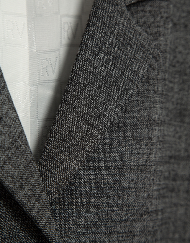 Chaqueta corta solapas punté gris