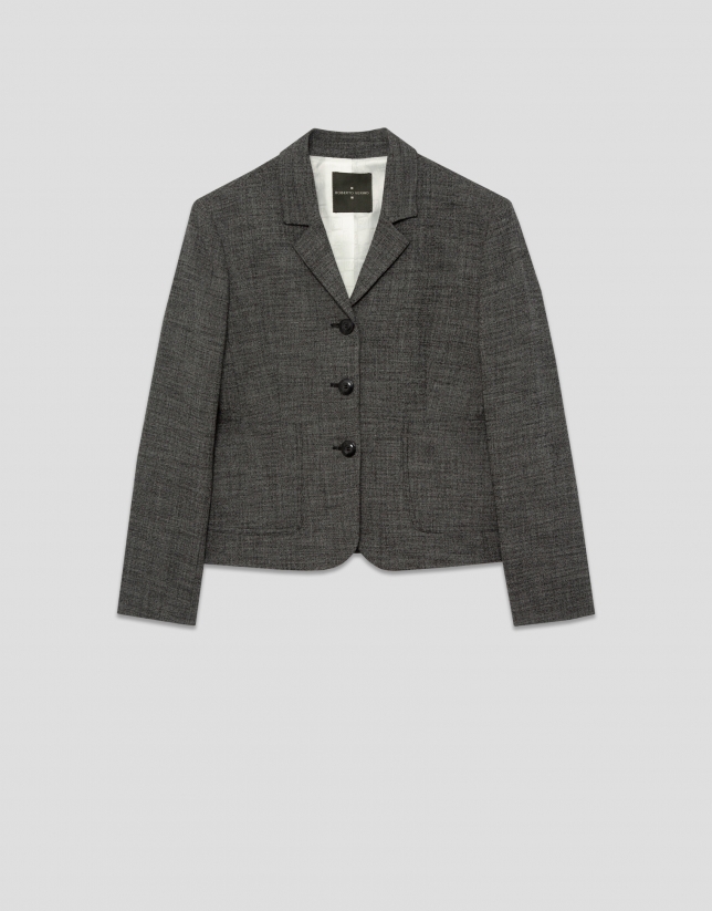 Chaqueta corta solapas punté gris
