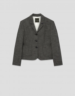 Chaqueta corta solapas punté gris