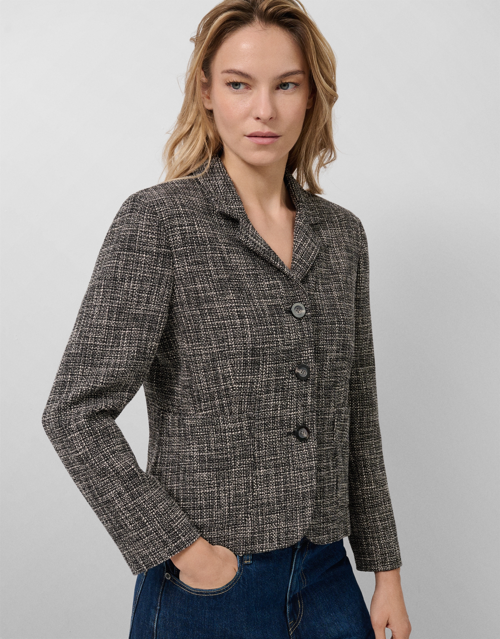 Short jacket with black and ecru weave lapels