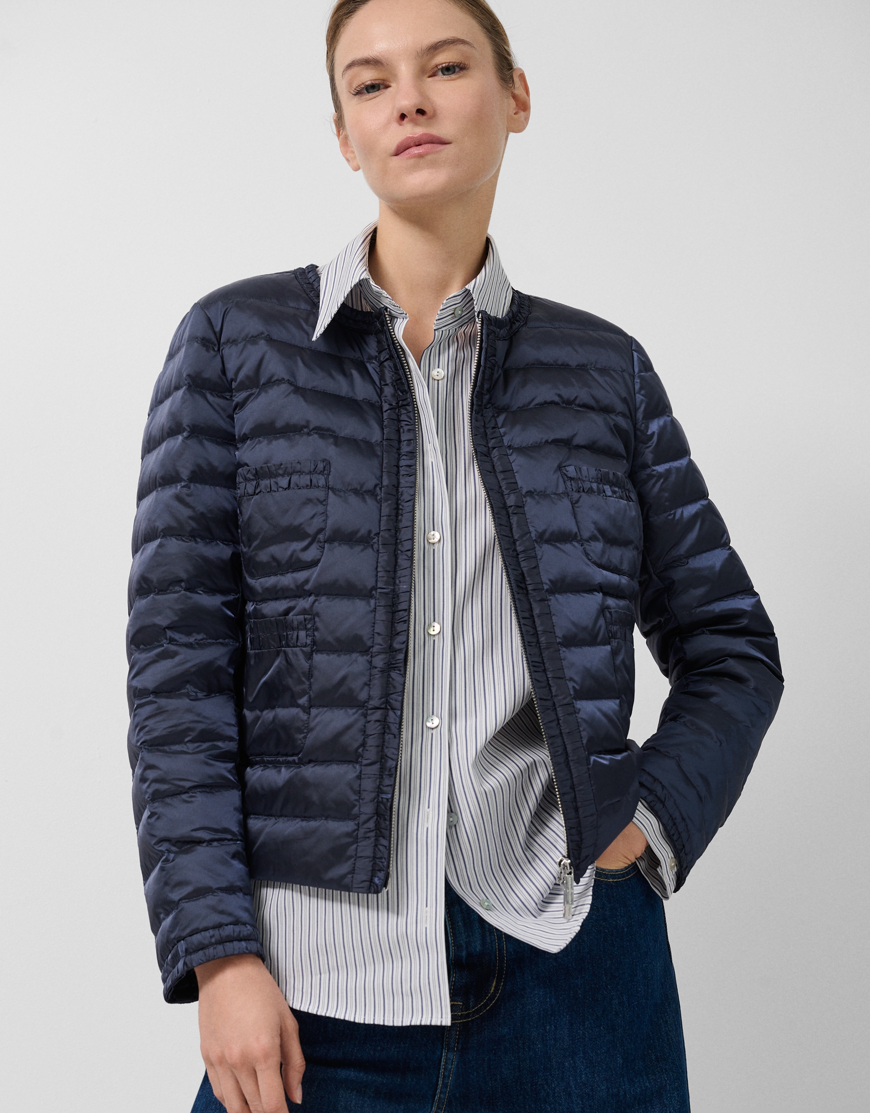 Chaqueta acolchada plumas cuatro bolsillos azul