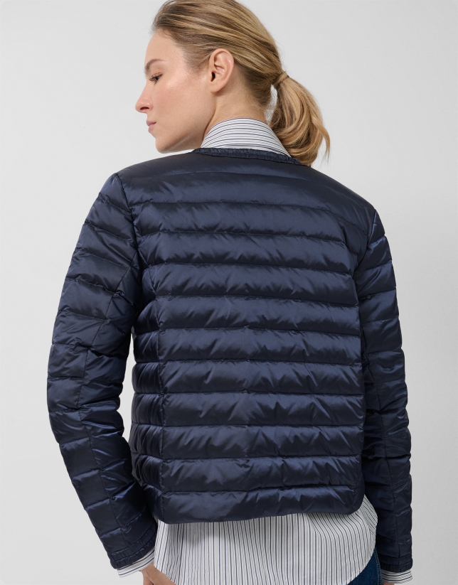 Chaqueta acolchada plumas cuatro bolsillos azul