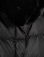 Short black quilted down jacket with fur collar