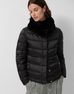 Short black quilted down jacket with fur collar