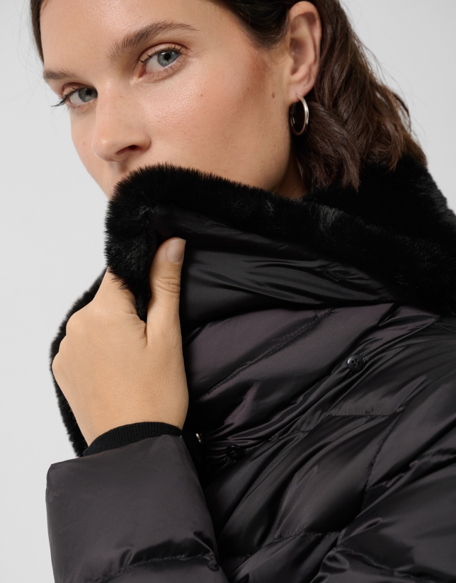 Short black quilted down jacket with fur collar