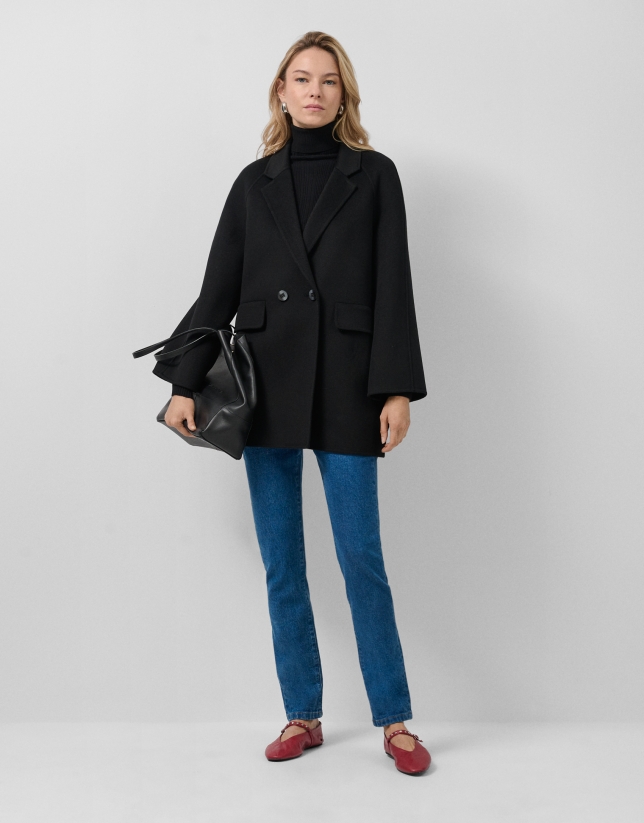 Short three-quarter length double-faced black coat
