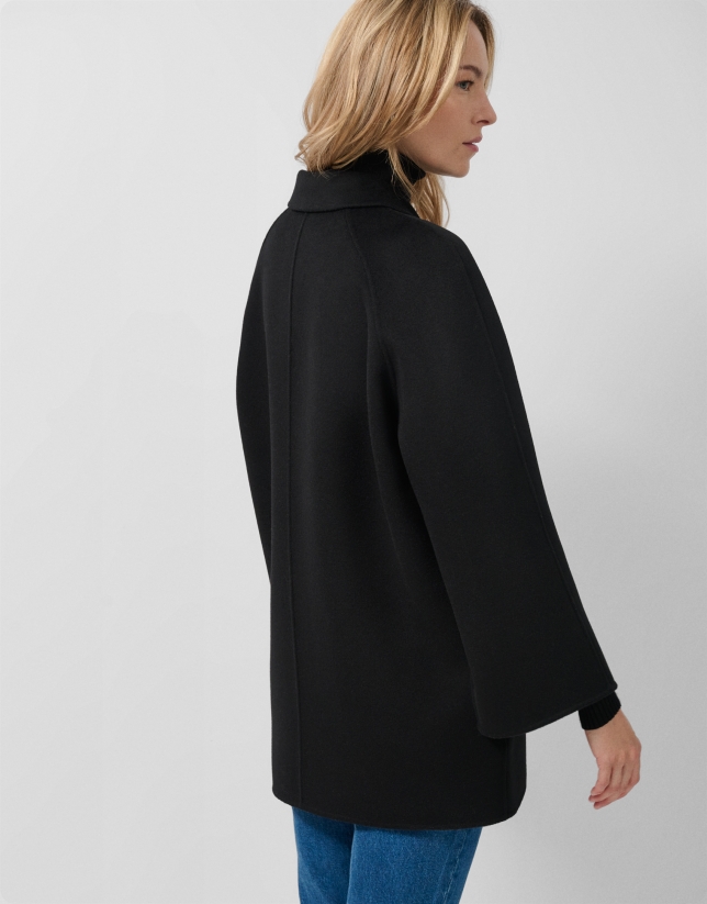 Short three-quarter length double-faced black coat