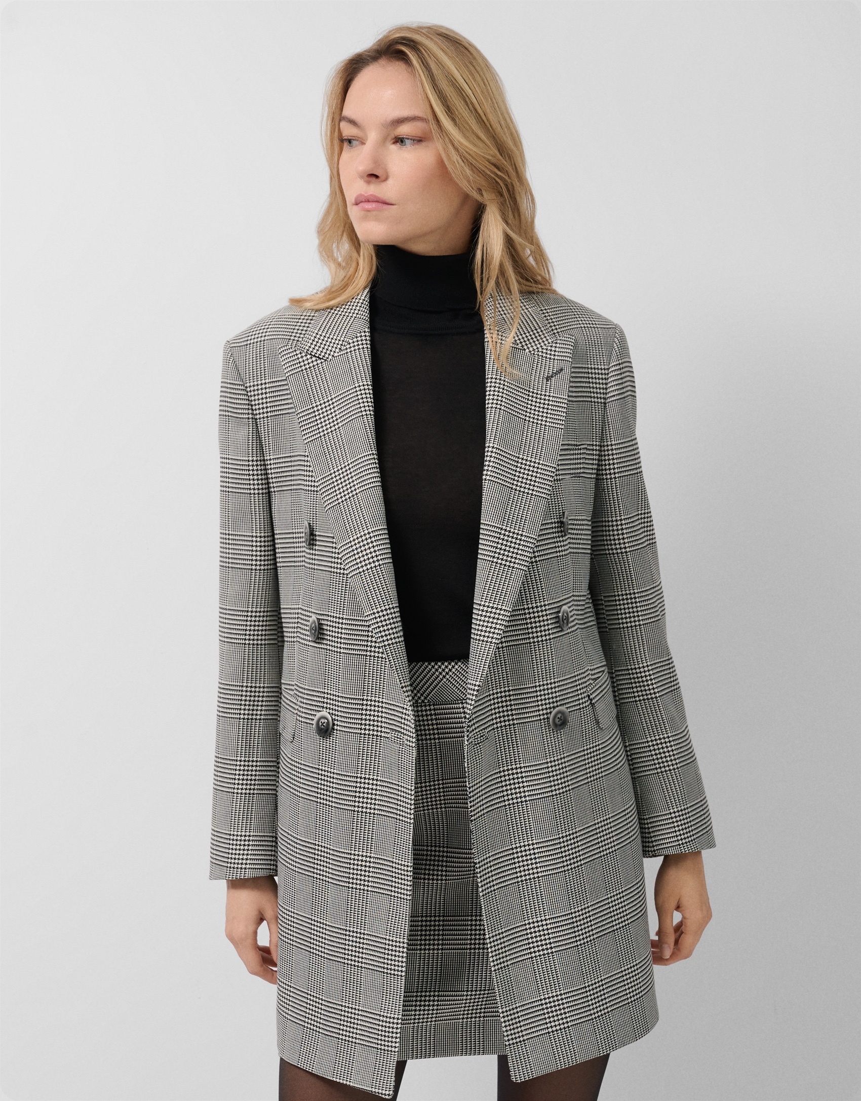 Black and white Welsh plaid double-breasted coat