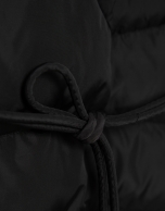 Long black down jacket with removable hood and faux fur