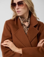 Light brown double-breasted three-quarter length coat