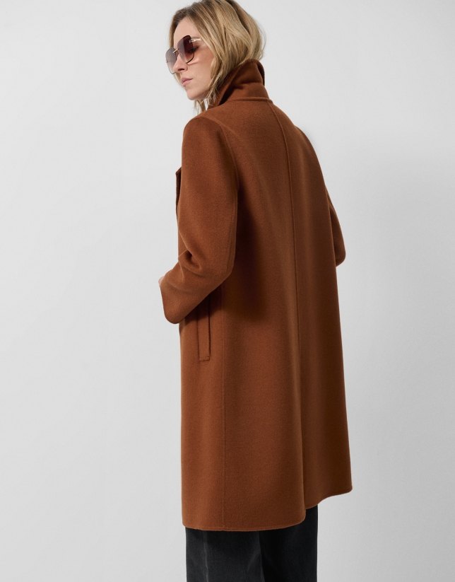 Light brown double-breasted three-quarter length coat