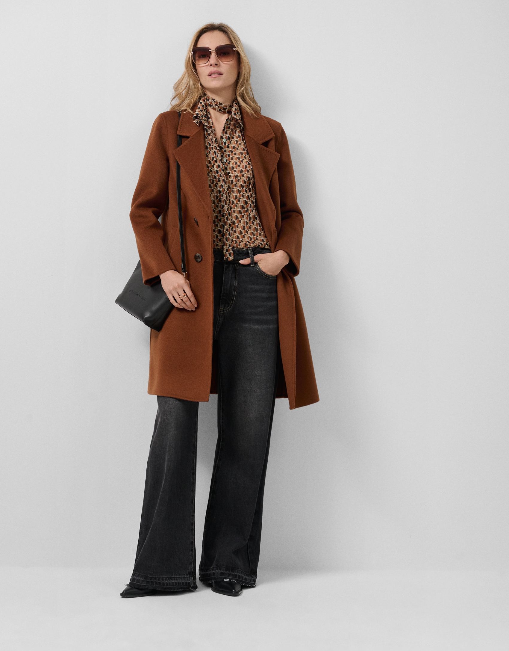Light brown double-breasted three-quarter length coat