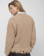 Jersey oversize beige con flecos