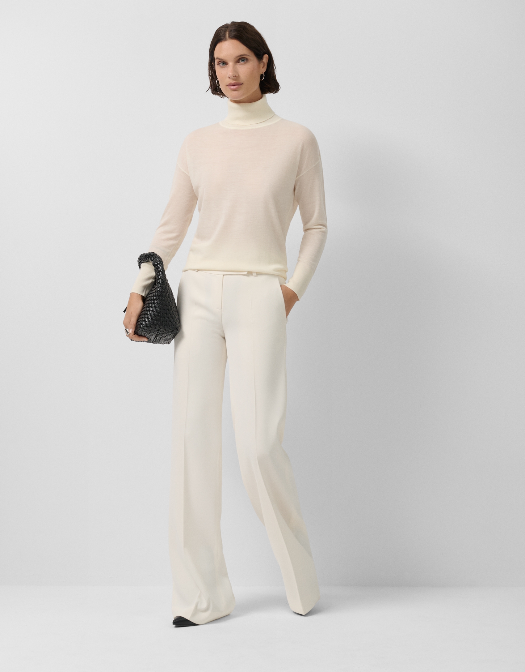 Ecru wool turtleneck sweater in fine knit