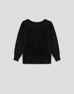 Black fine knit sweater with embroidered lace flowers on the sleeves