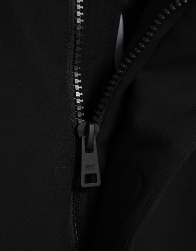 Long black quilted technical trench coat