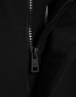 Long black quilted technical trench coat