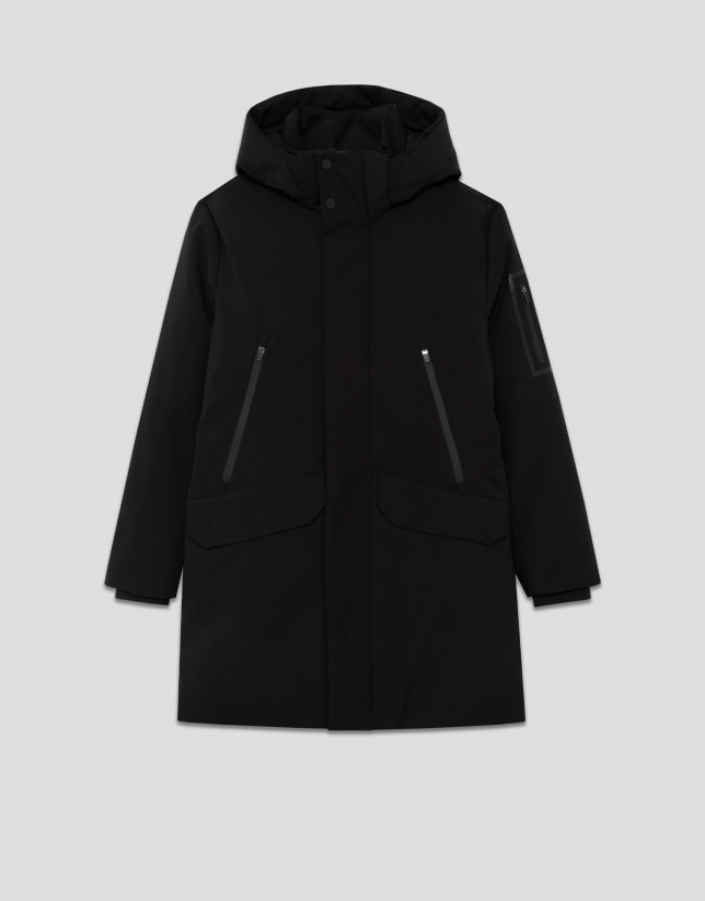 Long black quilted technical trench coat
