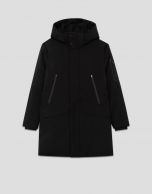 Long black quilted technical trench coat