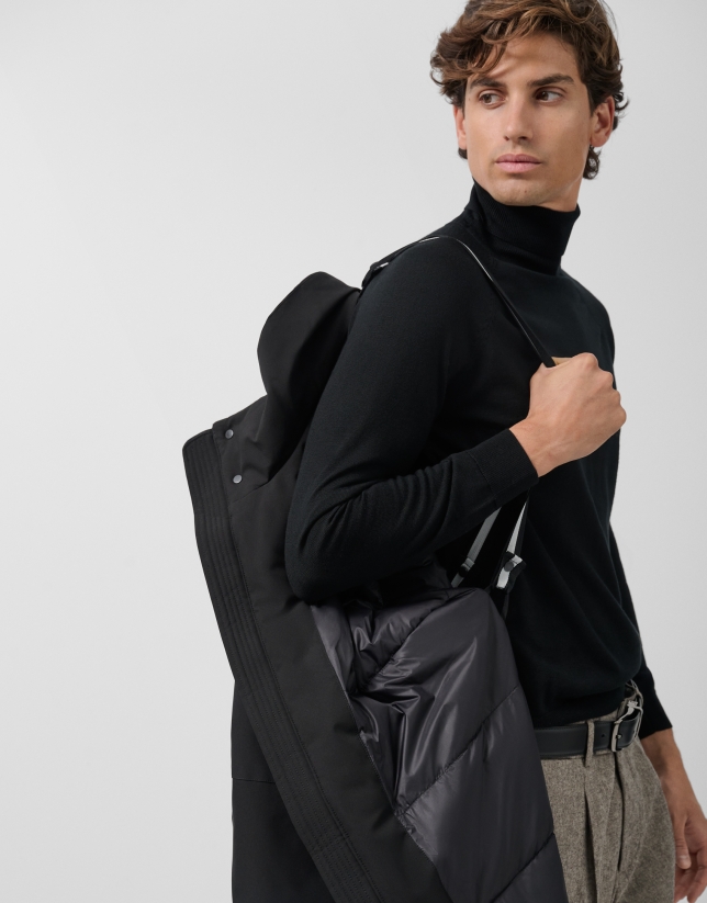 Long black quilted technical trench coat