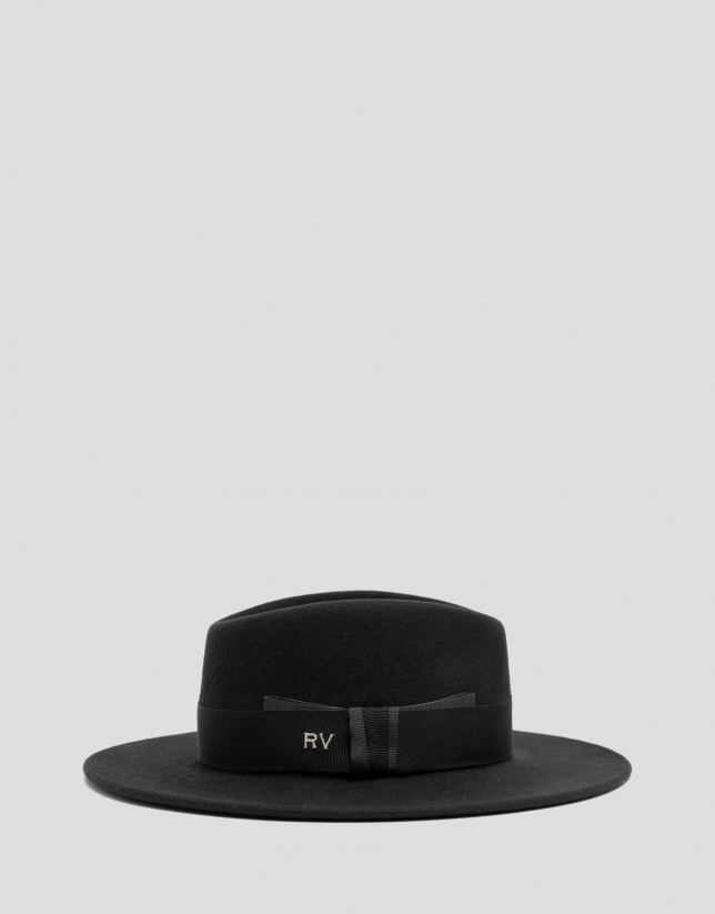 Wide-brimmed black felt hat with contrasting bow