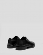 Black leather blucher-style brogue shoes