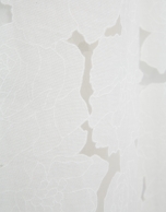 Pantal&oacute;n palazzo devor&eacute; blanco con estampado floral