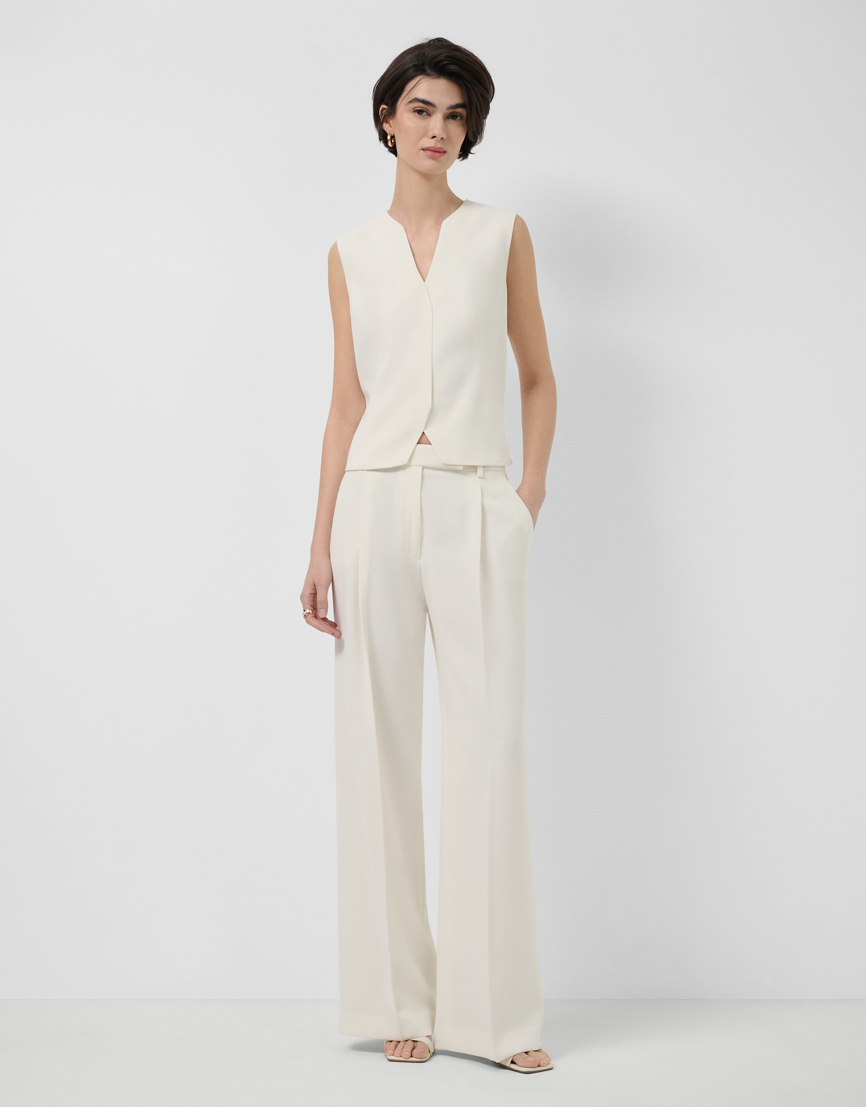 Straight trousers with crepe pleats in ecru